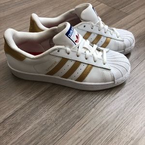 Worn once gold & white adidas superstar shoes